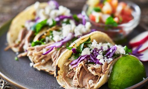 bigstock-Street-tacos-with-carnitas-225381346.jpg